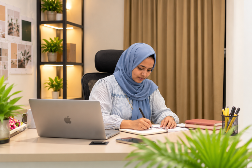 focused workspace hijab wearing designer